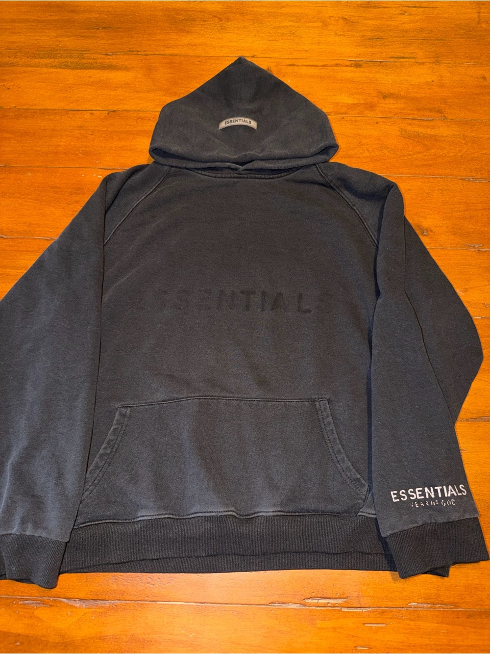 Essentials Men's Black Pullover Hoodie with Subtle Logo